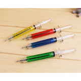 Stylos en forme de seringue x4 - Rouge, vert, jaune, bleu - Fournitures de bureau pour soignants- La Boutique Des Infirmières