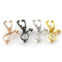 Broche en forme de stéthoscope - 4 coloris : Or rose, Noir, Argent, Or - Bijoux fantaisie La Boutique Des Infirmières