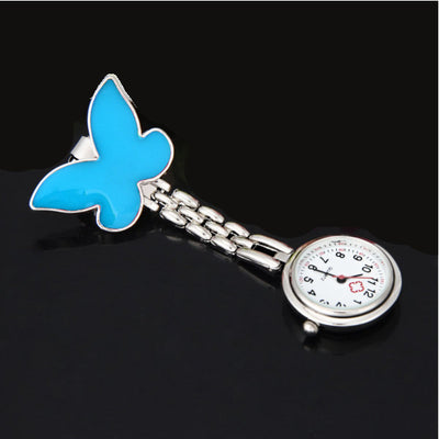 Montre papillons à pince pour blouse infirmière - Bleu clair