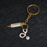 Porte-clés en forme de seringue et de stéthoscope pour infirmières et aide-soignantes